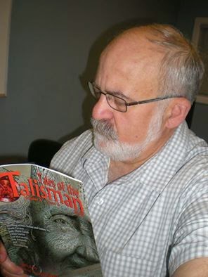 Lou perusing his latest publication. (Photo stolen from Lou Antonelli&#39;s blog.) - Lou-and-Talisman
